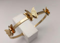 Gold toned Butterfly Charm handcuff bracelet